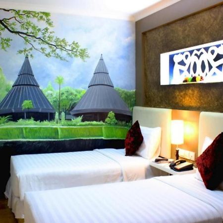 Amos Cozy Hotel Melawai Jakarta Exterior foto